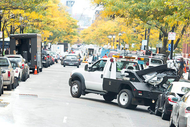 Dealing with Illegally Parked Cars Calling a Tow Truck or Taking Action Yourself